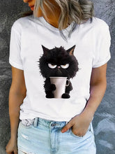 Load image into Gallery viewer, Person wearing a white t-shirt with a black cat holding a cup design.