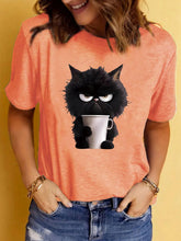 Load image into Gallery viewer, Person wearing a orange t-shirt with a black cat holding a coffee cup graphic