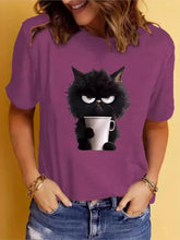 Load image into Gallery viewer, Person wearing a purple t-shirt with a black cat holding a cup design