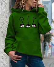 Load image into Gallery viewer, Person wearing a green hoodie with a cat design, Peeking Purrfection Kittie Hoodie - Whisker Woods Green - JBCoolCats