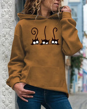 Load image into Gallery viewer, Person wearing a khaki hoodie with cat design, Peeking Purrfection Kittie Hoodie - Khaki Catnip Dune 
 - JBCoolCats