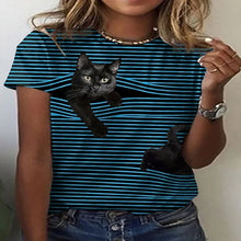 Load image into Gallery viewer, Person wearing a blue and black striped t-shirt with a black cat cat  peeking out graphic. Stripe and Seek: The Curious Cat T-Shirt - Midnight Meow - JBCoolCats