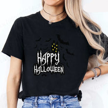 Load image into Gallery viewer, Person wearing a black t-shirt with white 'Happy Halloween' design - JBCoolCats