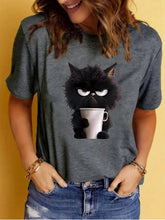 Load image into Gallery viewer, Person wearing a gray t-shirt with a black cat holding a cup design