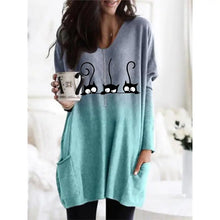 Load image into Gallery viewer, Woman wearing a turquoise  and gray tunic with black cat designs, - Three Cat Twilight Tunic - Clothing - JBCoolCats 