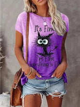 Load image into Gallery viewer, Person wearing a purple t-shirt with a cat graphic and text, holding a brown bag. I’m Fine… Totally Feline Tee - Clothing - JBCoolCats