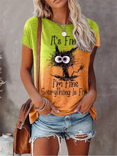 Load image into Gallery viewer, Person wearing a green and orange t-shirt with a graphic design and text. I’m Fine… Totally Feline Tee - Clothing - JBCoolCats