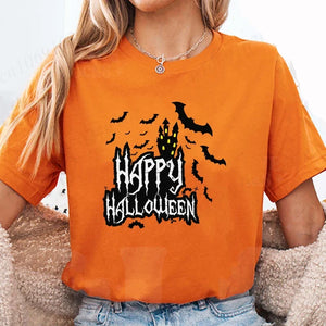 Person wearing an orange t-shirt with a Halloween design featuring bats and a castle.Happy Halloween' design - JBCoolCats