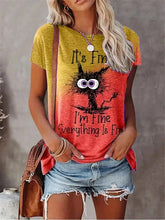 Load image into Gallery viewer, Woman wearing a colorful t-shirt with a graphic and text, holding a brown bag. I’m Fine… Totally Feline Tee - Clothing - JBCoolCats