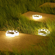 Load image into Gallery viewer, Solar lawn lights in the shape of cat paws, glowing in the dark, on stepping boards . -Cat Paw Solar Lawn Lights - Accessory - JBCoolCats