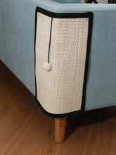 Load image into Gallery viewer, Cat scratcher attached to a light blue sofa with wooden legs. Purrch &amp; Scratch Anywhere Post - Options - JBCoolCats