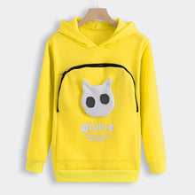 Load image into Gallery viewer, Yellow hoodie with a cartoon face design on a hanger against a white background. Snuggle‑Me Pet Pouch Hoodie - Mellow Meow‑llow - JBCoolCats 