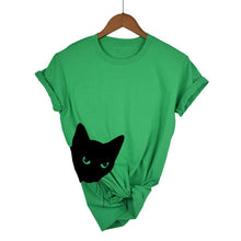 Load image into Gallery viewer, Green t-shirt with a black cat graphic on a hanger against a white background  - JBCoolCats