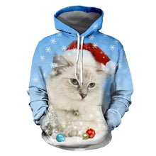 Load image into Gallery viewer, Hoodie with a cat wearing a Santa hat and Christmas ornaments on a blue background with snowflakes. Kitty Cuteness Christmas Hoodie - Christmas - JBCoolCats
