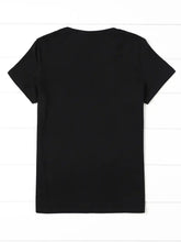 Load image into Gallery viewer, Black t-shirt on a white wooden surface Chic Silhouette Cat Tee - Back View - JBCoolCats