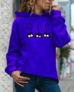 Person wearing a Blue hoodie with cat designs, Peeking Purrfection Kittie Hoodie - Ocean Paws Blue
- JBCoolCats
