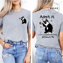 Load image into Gallery viewer, Gray t-shirt with a cat graphic and text on the front and back, worn by a person.  Paws &amp; Applause T-shirt - Whisker Whisper - JBCoolCats