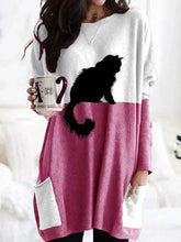 Load image into Gallery viewer, Person wearing a white and pink dress with a black cat design, holding a mug.   - JBCoolCats